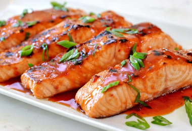 cooked salmon on white plate